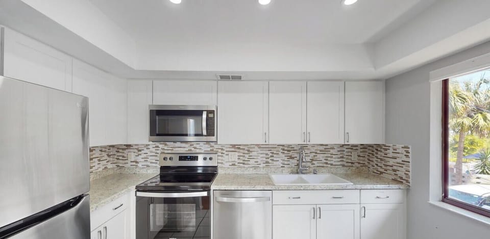 Full kitchen, pots, pans, utensils, silverware, dishware, glassware