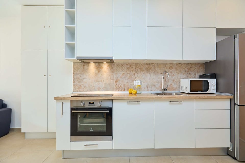 Apartment (2 Bedrooms) | Private kitchen | Microwave, oven, stovetop, dishwasher