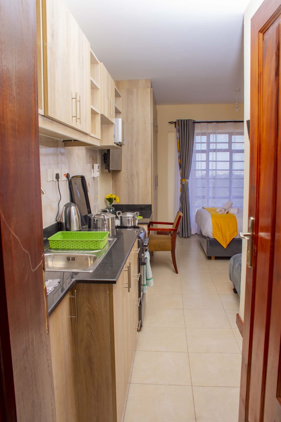 Standard Apartment, 1 Queen Bed | Private kitchen | Mini-fridge, microwave, cleaning supplies