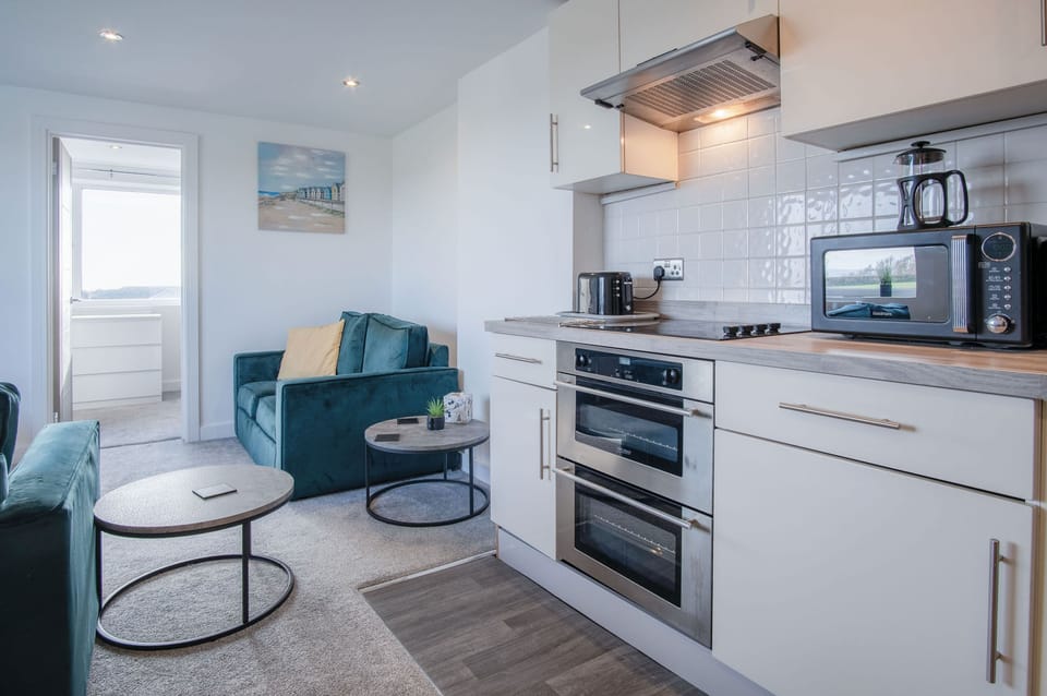Luxury Apartment | Private kitchen | Fridge, microwave, oven, stovetop