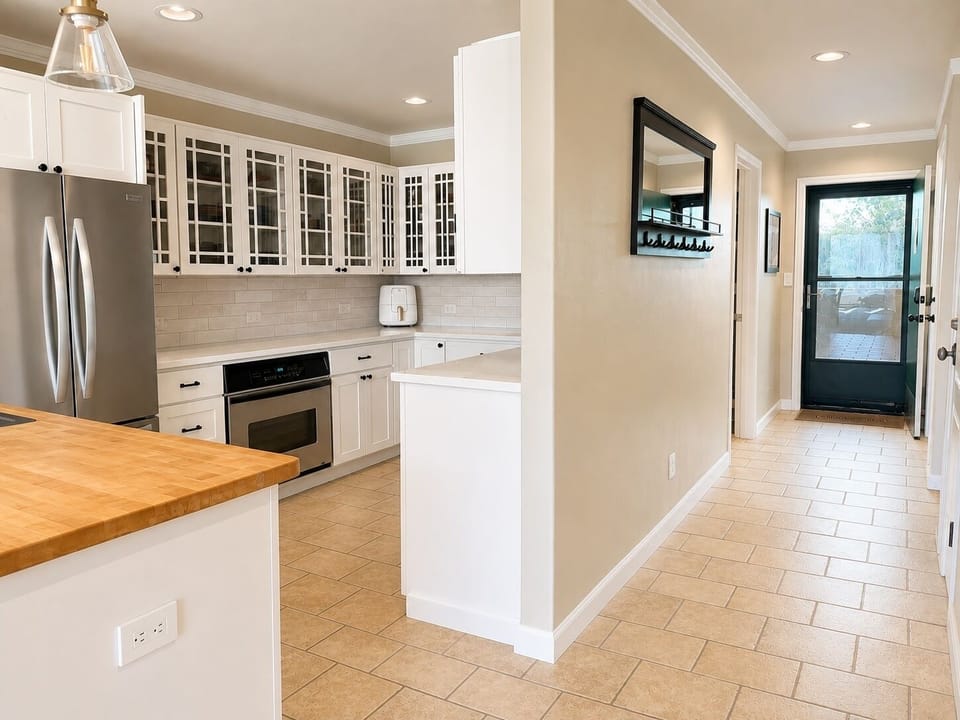 Kitchen and condo entry