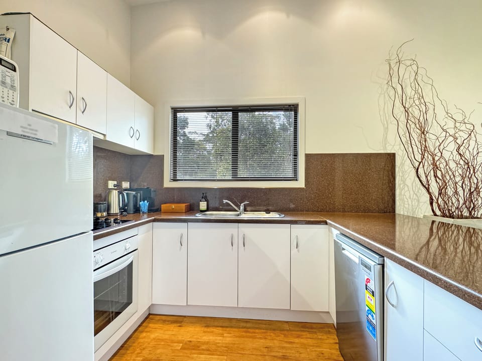 The kitchen is equipped with everything you need to prepare a home-cooked meal.