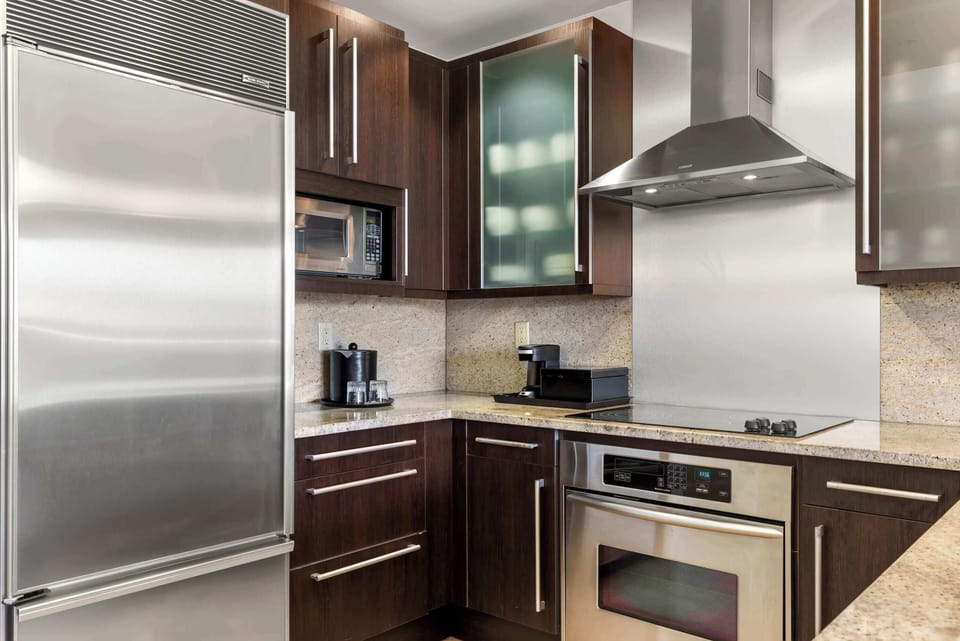 Full kitchen with stainless steel appliances