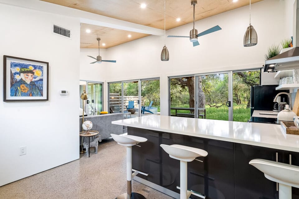 Welcome to Twin Oaks – a fresh, modern space that invites the outdoors in