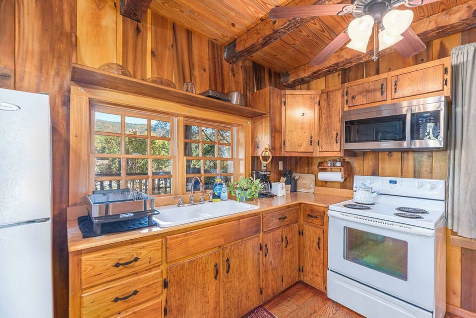 The kitchen is equipped with items so that you can make a meal at home. 