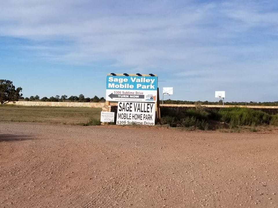 Entrance and sign to the Mobile home park.