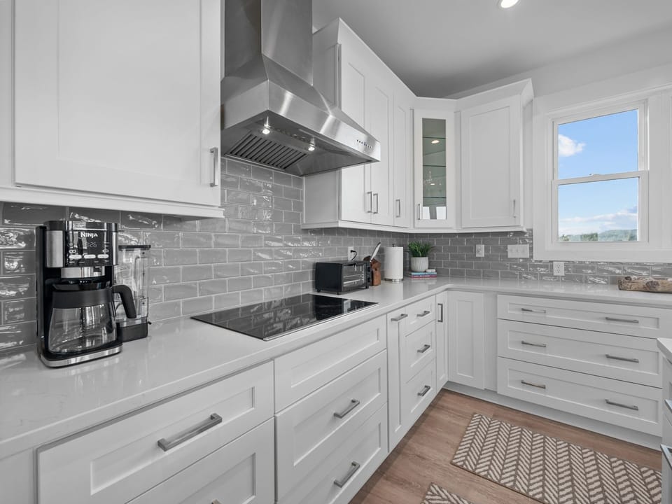 Custom kitchen with prep space and all the appliances you need