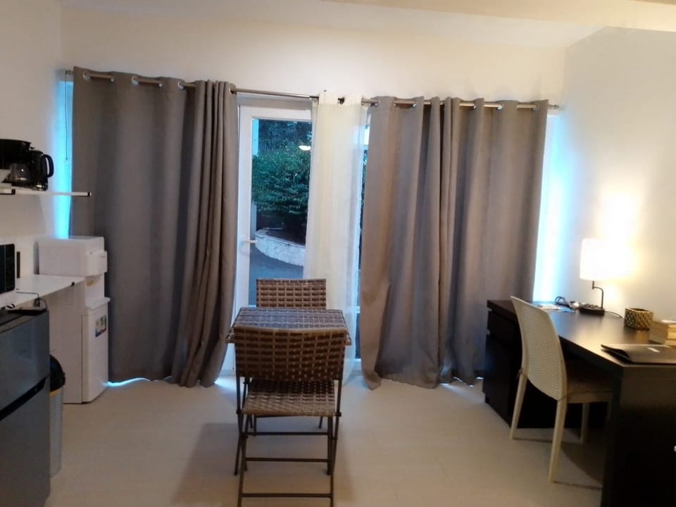 Master bedroom with front gate and street view.
