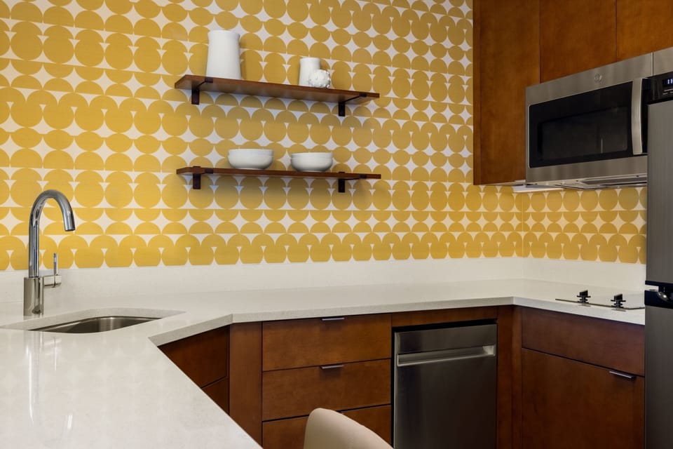 Suite, 1 Bedroom | Private kitchen | Full-size fridge, microwave, stovetop, dishwasher