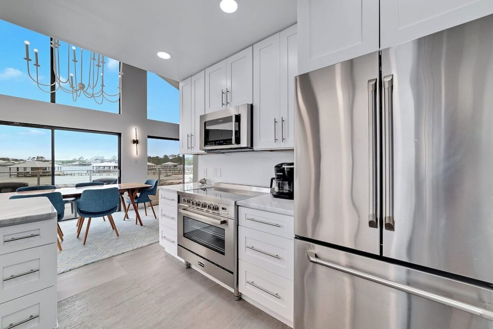 Large kitchen with stainless steel appliances