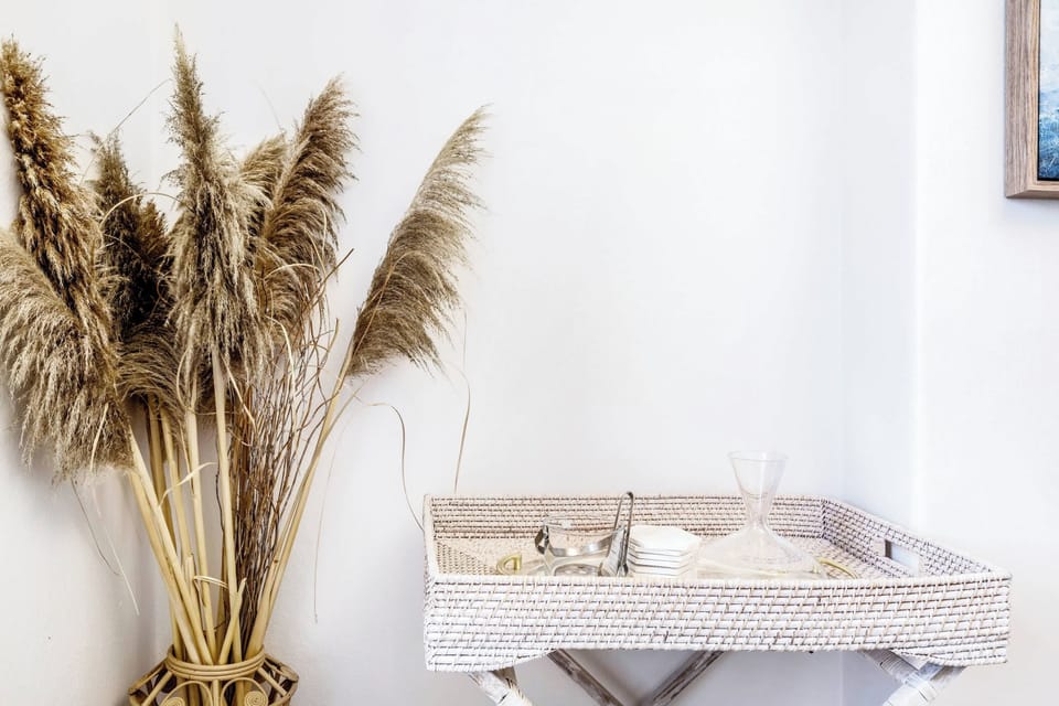 A simple yet elegant corner display featuring dried pampas grass