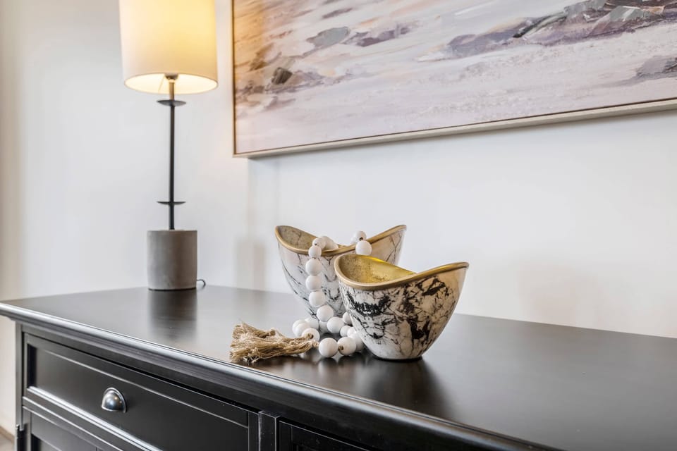 A tastefully decorated lounge with modern furnishings and thoughtful details