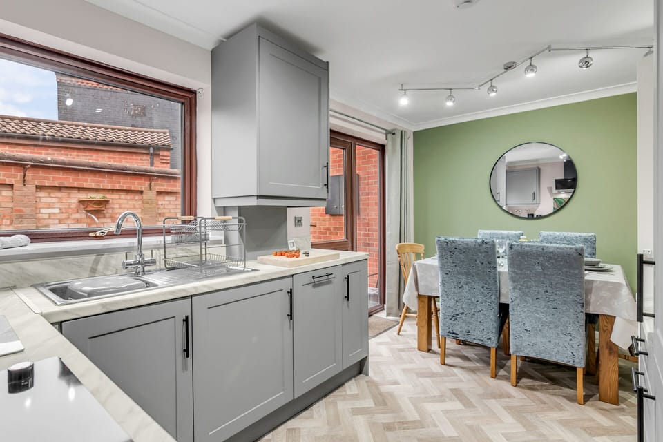 Effortless convenience: Our kitchen sink awaits, making meal prep and cleanup a breeze in our inviting property. 