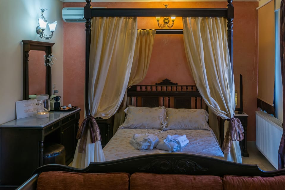 Deluxe Suite, 1 Bedroom, Jetted Tub, Bay View | Premium bedding, in-room safe, desk, blackout drapes