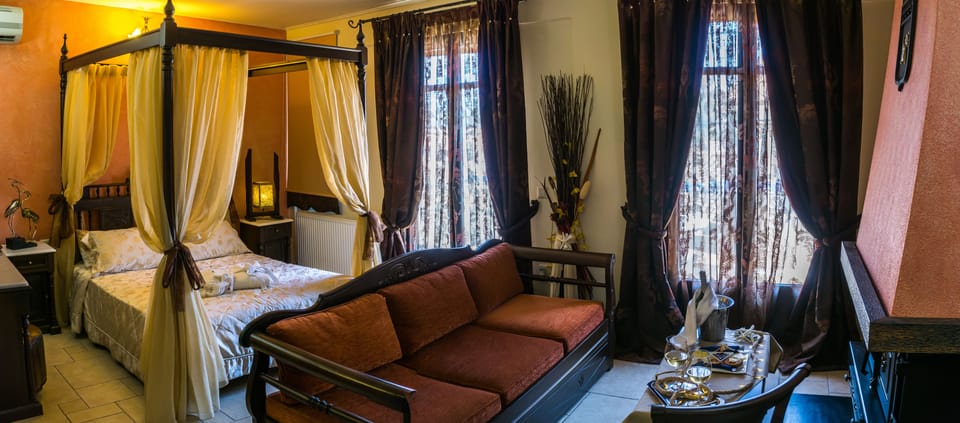 Deluxe Suite, 1 Bedroom, Jetted Tub, Bay View | Premium bedding, in-room safe, desk, blackout drapes