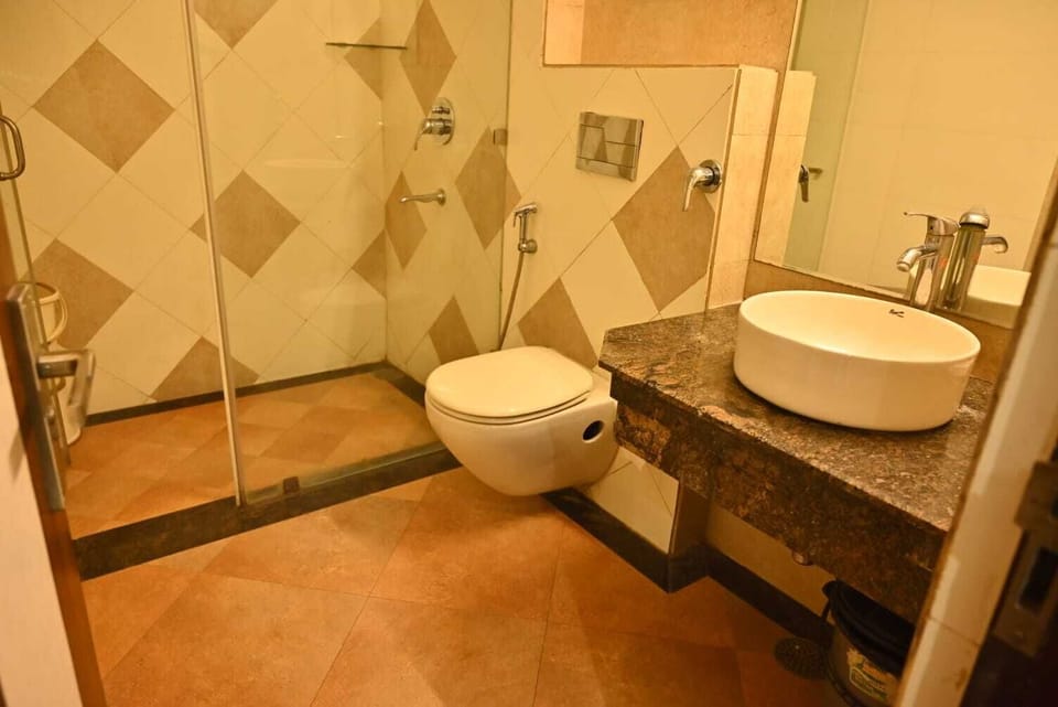 Deluxe Room | Bathroom | Free toiletries