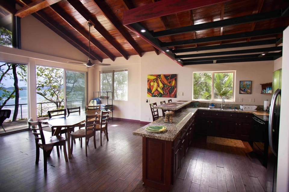 Dining Area & Full Kitchen With Ocean Views