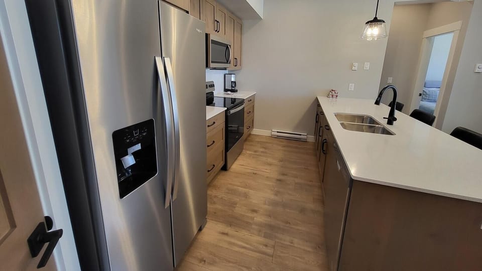 Townhome, 2 Bedrooms | Private kitchen | Coffee/tea maker, fridge, oven, toaster
