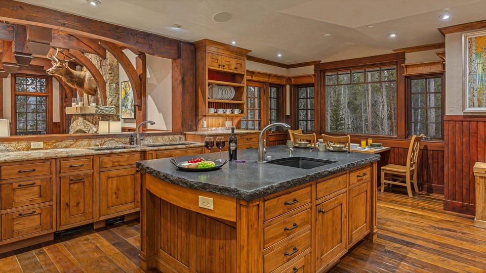 Gourmet kitchen with breakfast nook seating