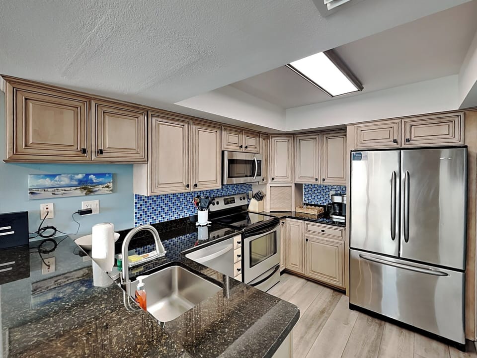 Fully Equipped Kitchen with Stainless Steel Appliances
