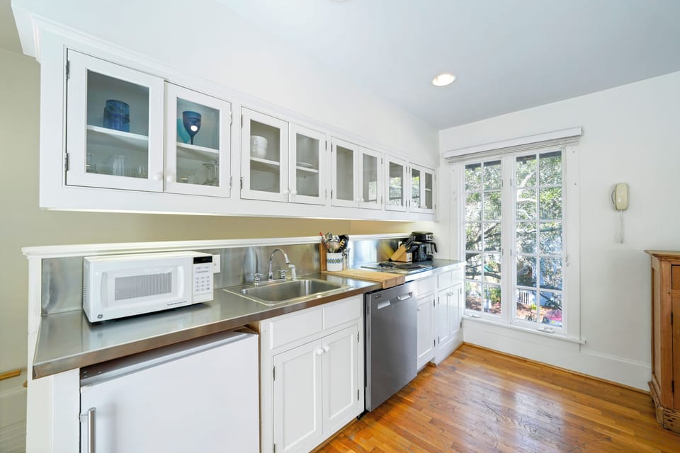 KITCHEN AREA W/COMPACT FRIDGE, MICROWAVE, & DISHWASHER