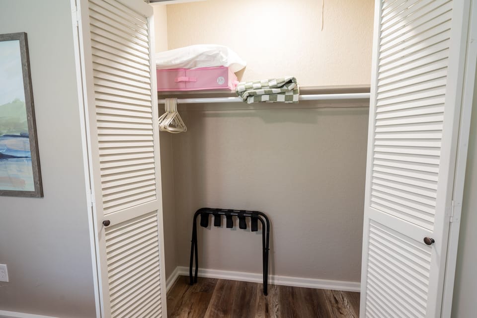Green bedroom closet.