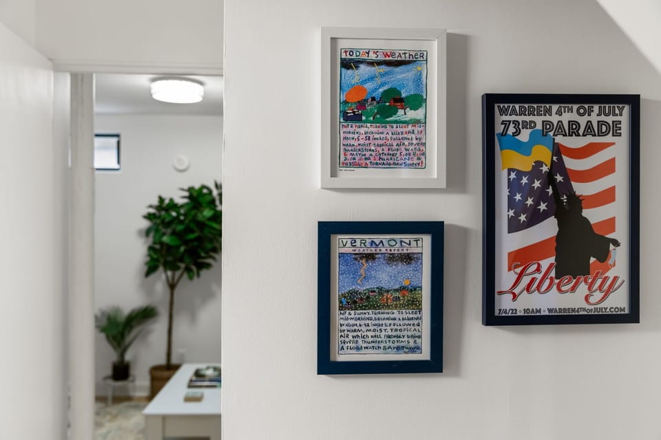 - Framed artwork adds charm and local style to Airbnb interiors   - Vacation stay highlights wall decor with Vermont inspired art   - Airbnb rental features unique touches for memorable stay