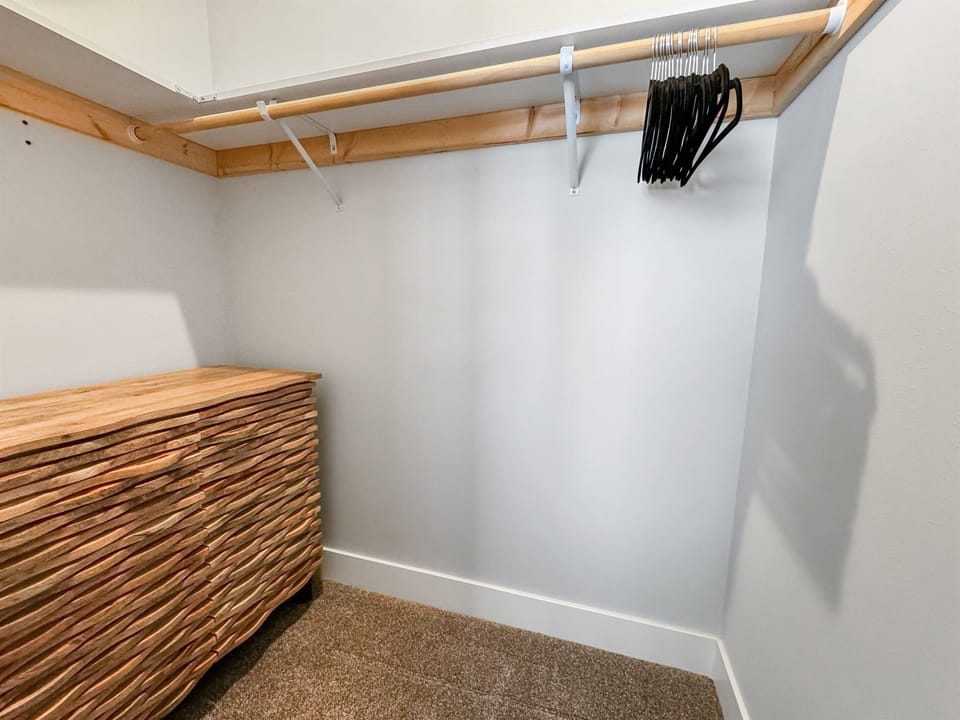 Walk-in closet with dresser for 2nd King bedroom on Main floor.