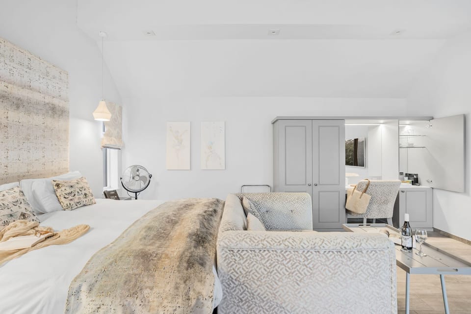 Open plan interior with seating for 2 and King size bed - Cottage Suite 5, Kentisbury Grange