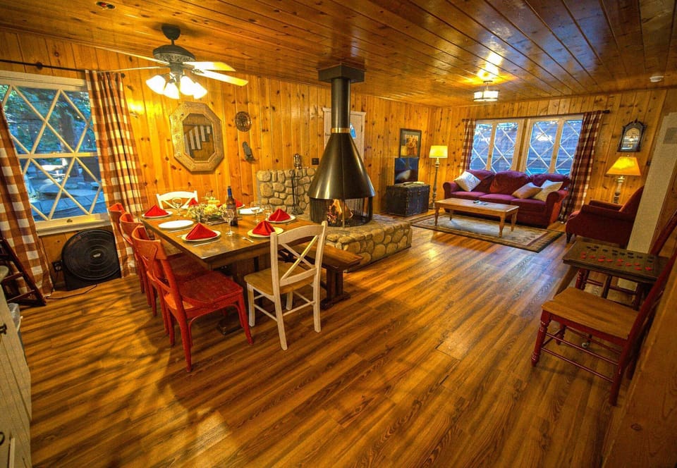 Dining room and living room with real wood-burning fireplace