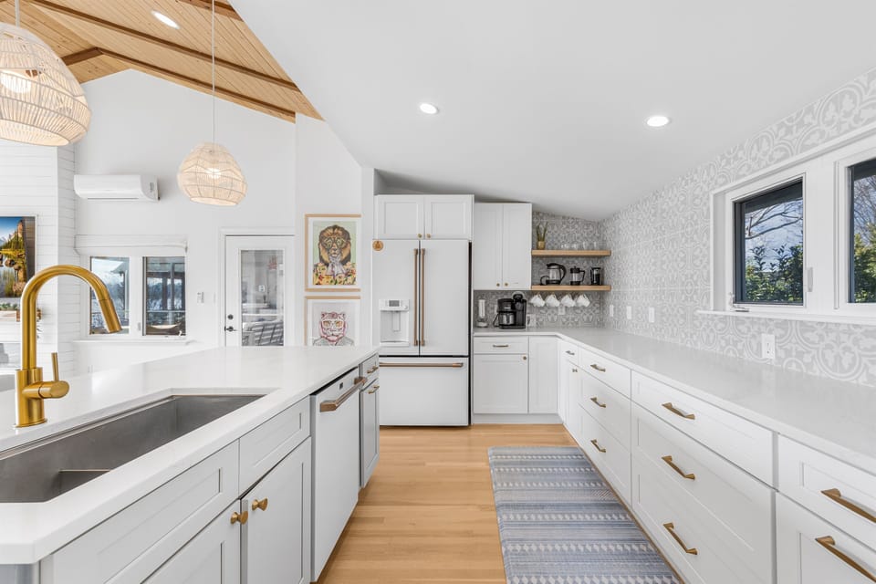Brand new luxury white & brass appliances.