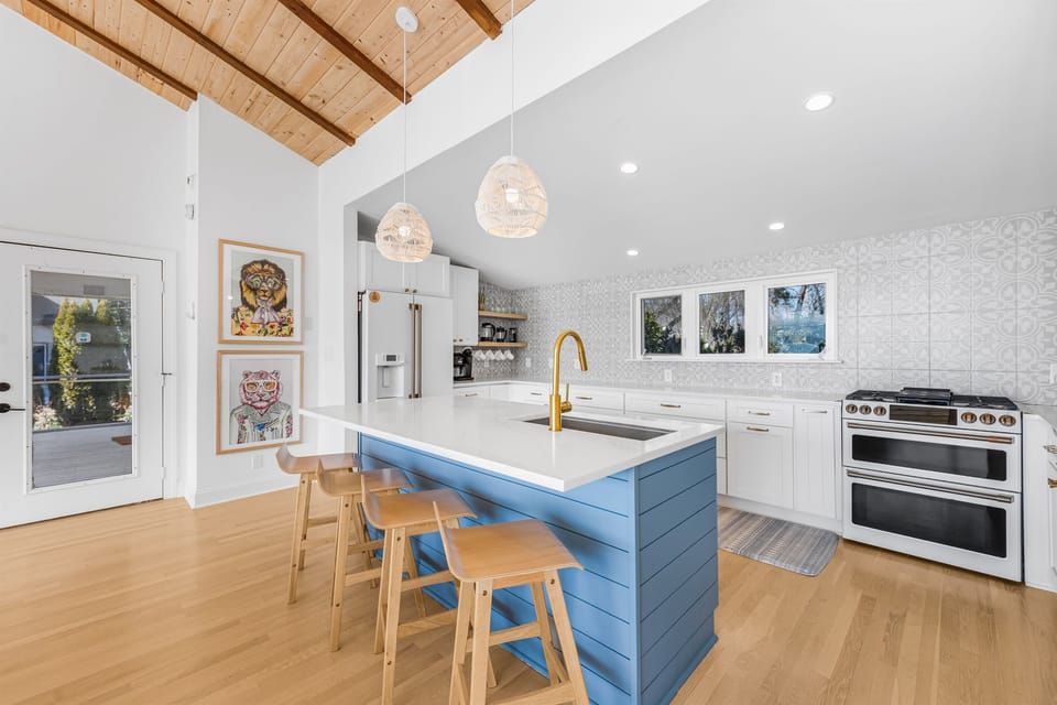 Newly remodeled kitchen with quartz counters.