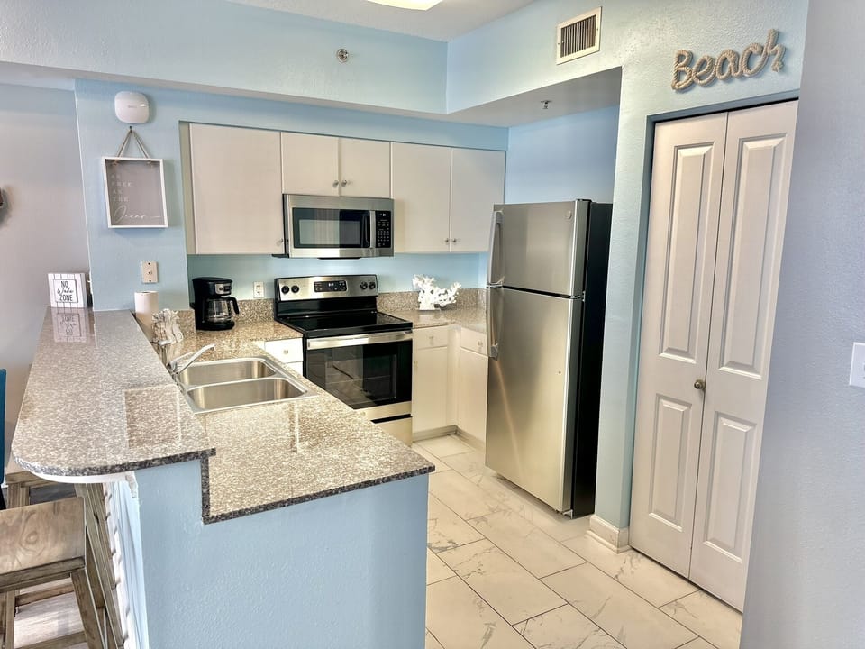Fully Equipped Kitchen • Stainless Appliances • Granite Counters • Ideal for Beach Stay Cooking