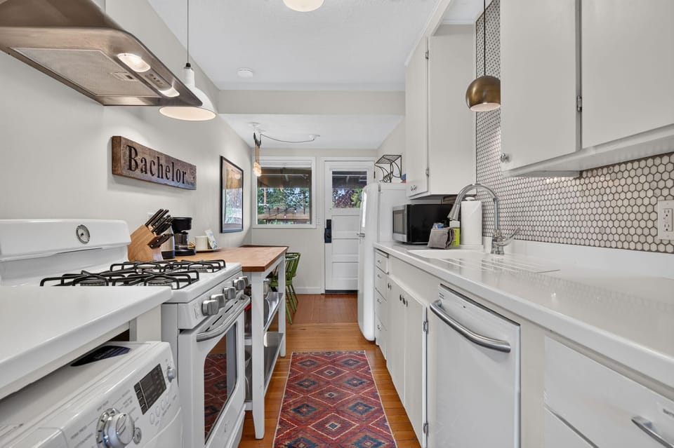 The galley kitchen has all the appliances you'd expect and more.