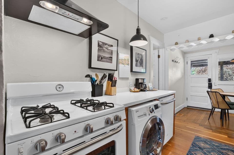Gas cooking with an external venting, you'll love having a full kitchen. There is a Euro style combo washer/dryer in the kitchen as well