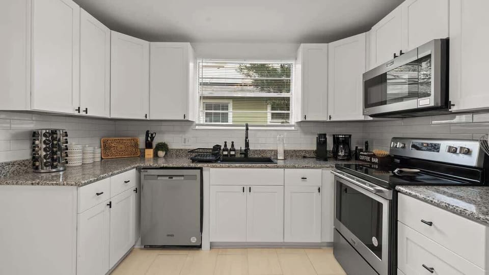 Cook like a chef, relax like a guest. Fully equipped modern kitchen designed for comfort and convenience.