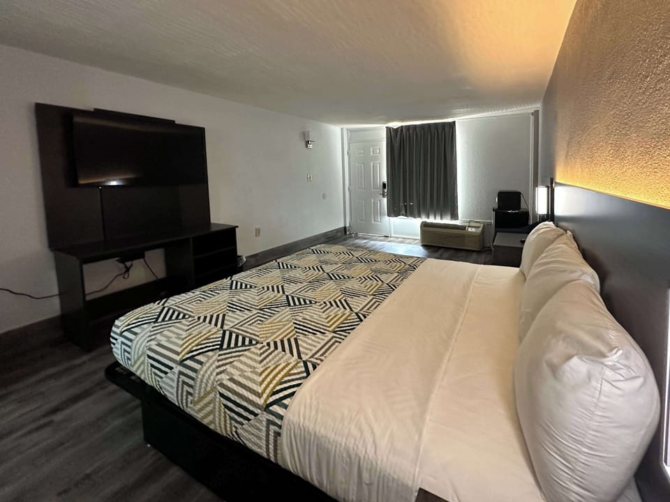 Desk, laptop workspace, blackout drapes, free WiFi