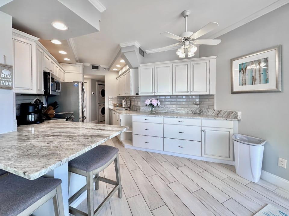 Custom tile backsplash recently added.