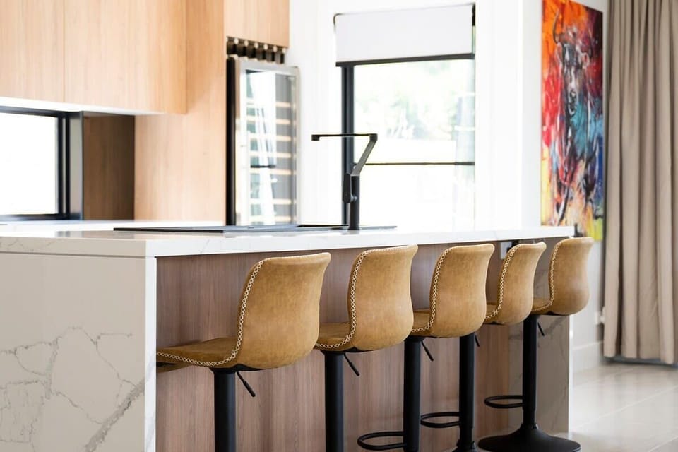 Kitchen + Breakfast Bar & Seats + Luxurious Wine Fridge