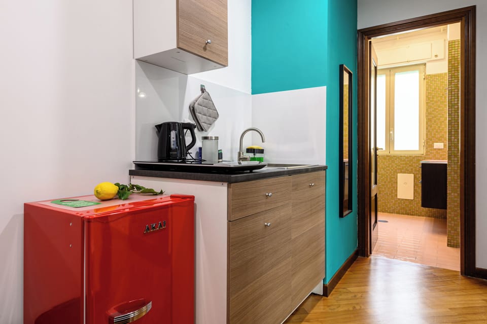 Family Apartment, Balcony, City View | Private kitchen | Espresso maker, coffee/tea maker, shared fridge, shared microwave