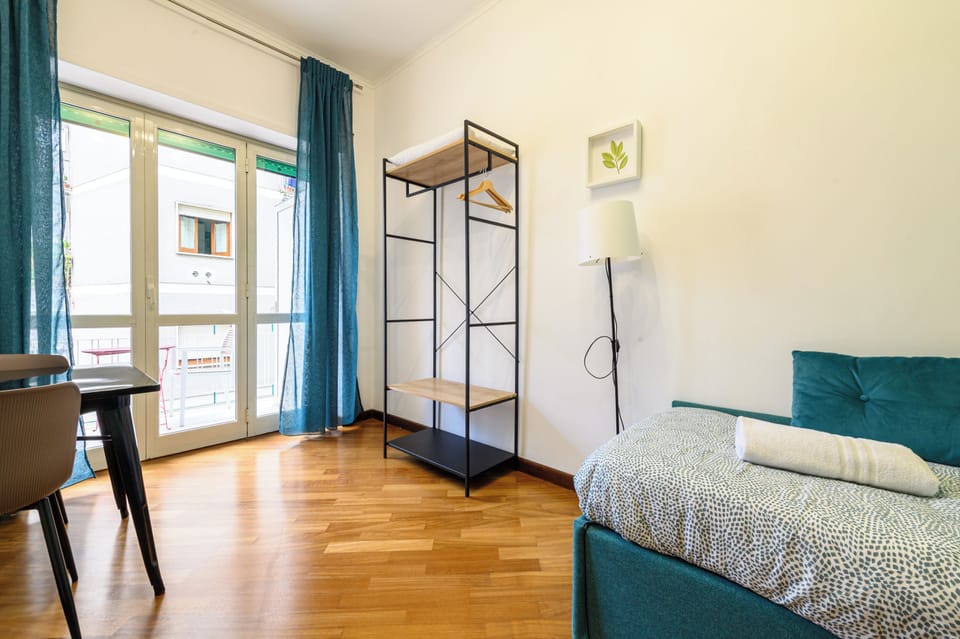 Family Apartment, Balcony, City View | Living area | Smart TV