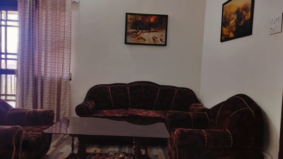 Family Room, Hill View | Living area | Flat-screen TV