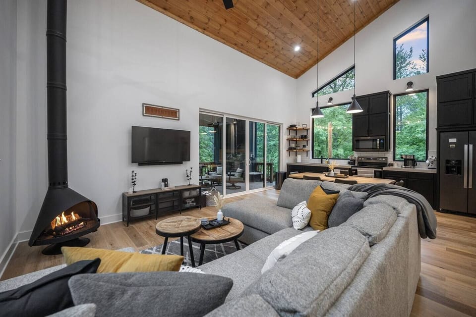 Comfortable seating around free-standing, stove style fireplace