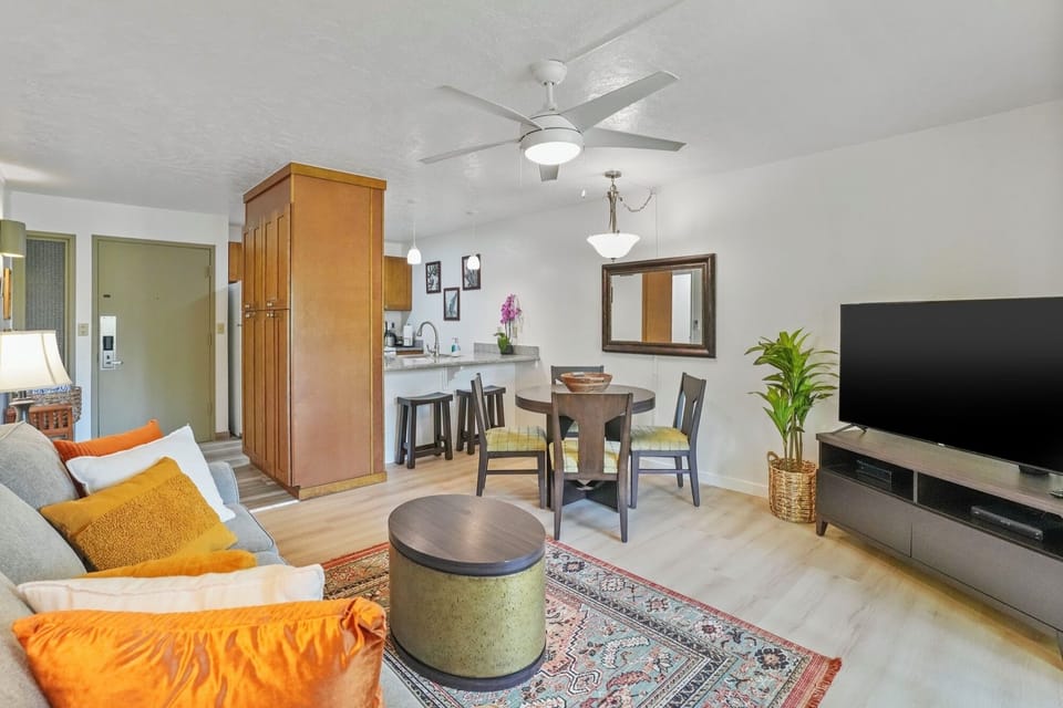 The fully open floor plan seamlessly connects the living, dining, and kitchen areas—perfect for couples or small families to relax and reconnect.