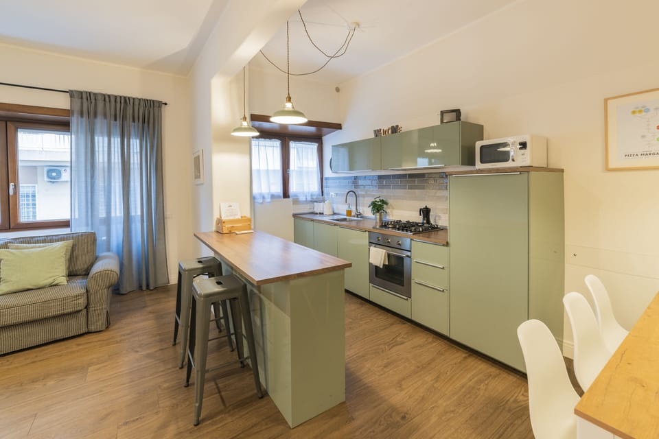 Comfort Apartment, 4 Bedrooms | Private kitchen | Espresso maker, coffee/tea maker, electric kettle, dining table