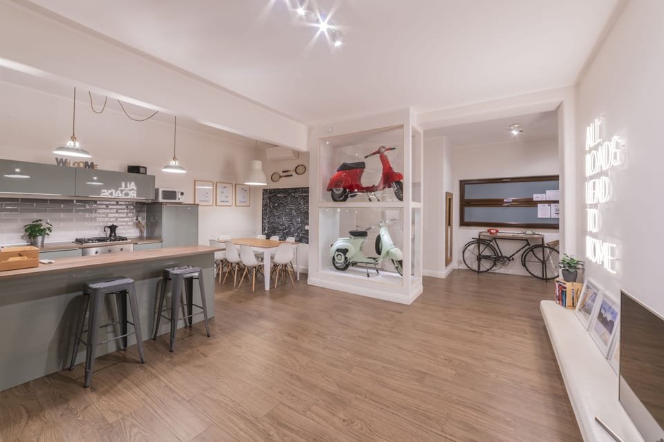 Comfort Apartment, 4 Bedrooms | Living area | 55-inch LED TV with digital channels