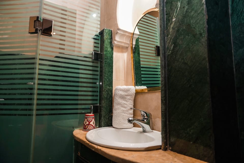 Double Room, Courtyard View | Bathroom | Free toiletries, hair dryer, towels, soap