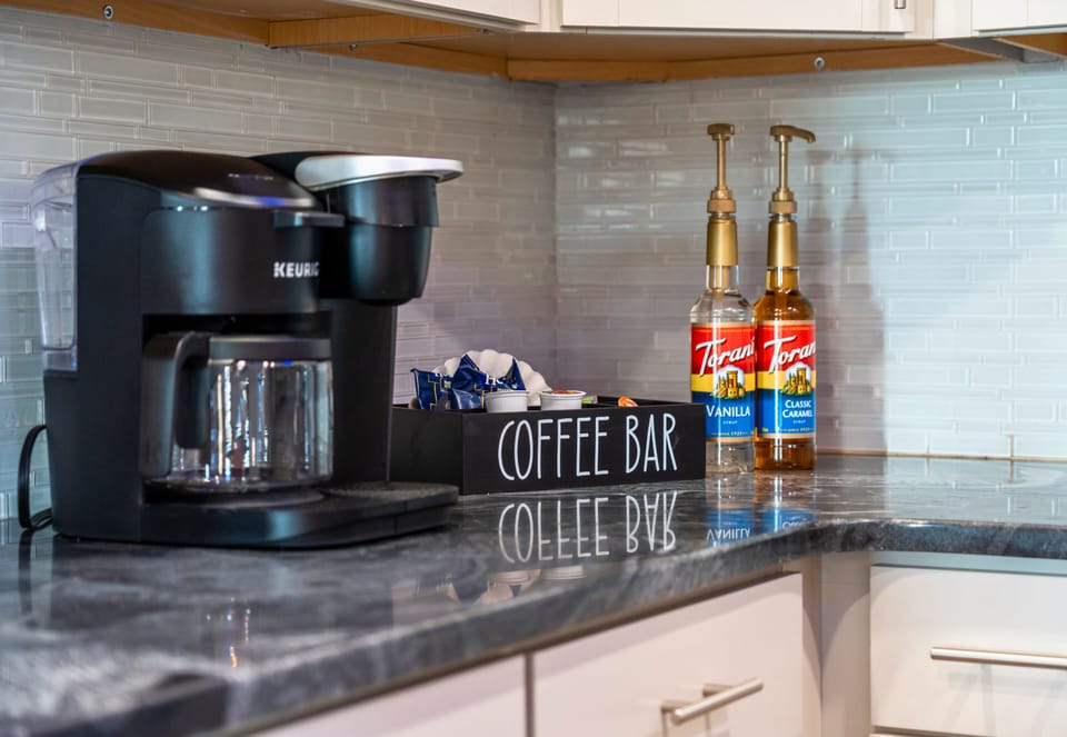 [Coffee Bar] We've Provided a Dual Function Coffee Maker, Syrups and Creamers!