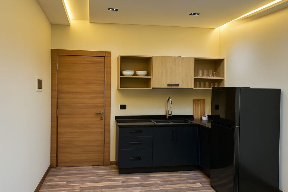 Mini-fridge, electric kettle, cookware/dishes/utensils
