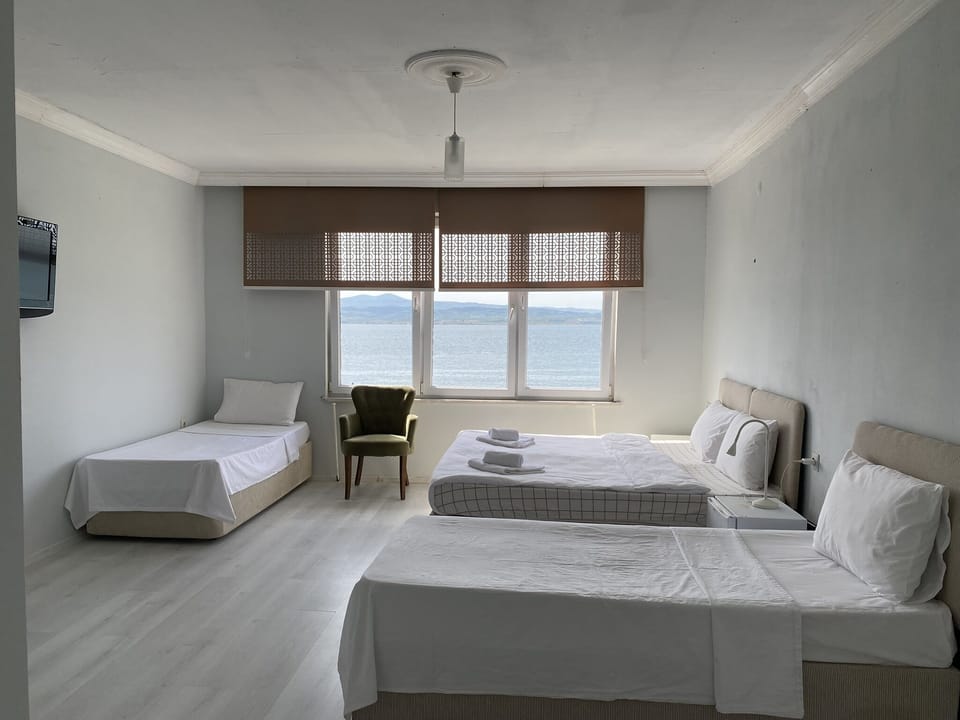 Basic Quadruple Room | Free WiFi, bed sheets